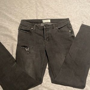 Free People black fade look jeans with mesh lining.